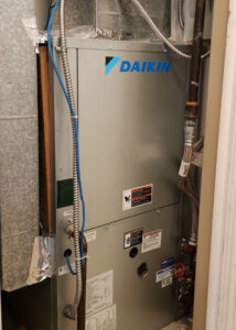 McQuay vertical water source heat pump replacement inside 393 King St W condo unit